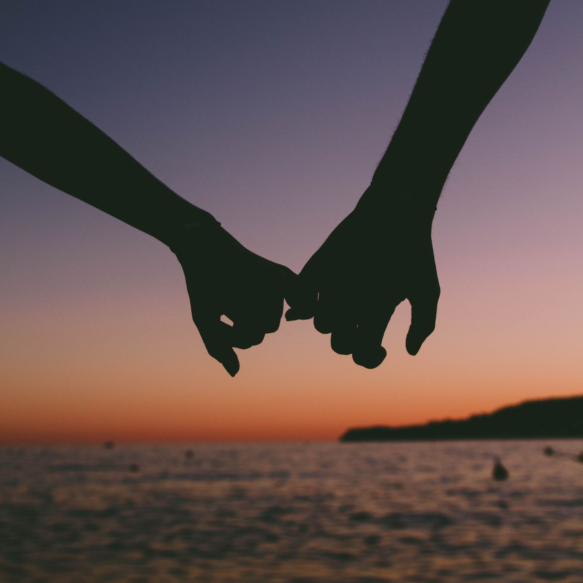 Couple holding hands