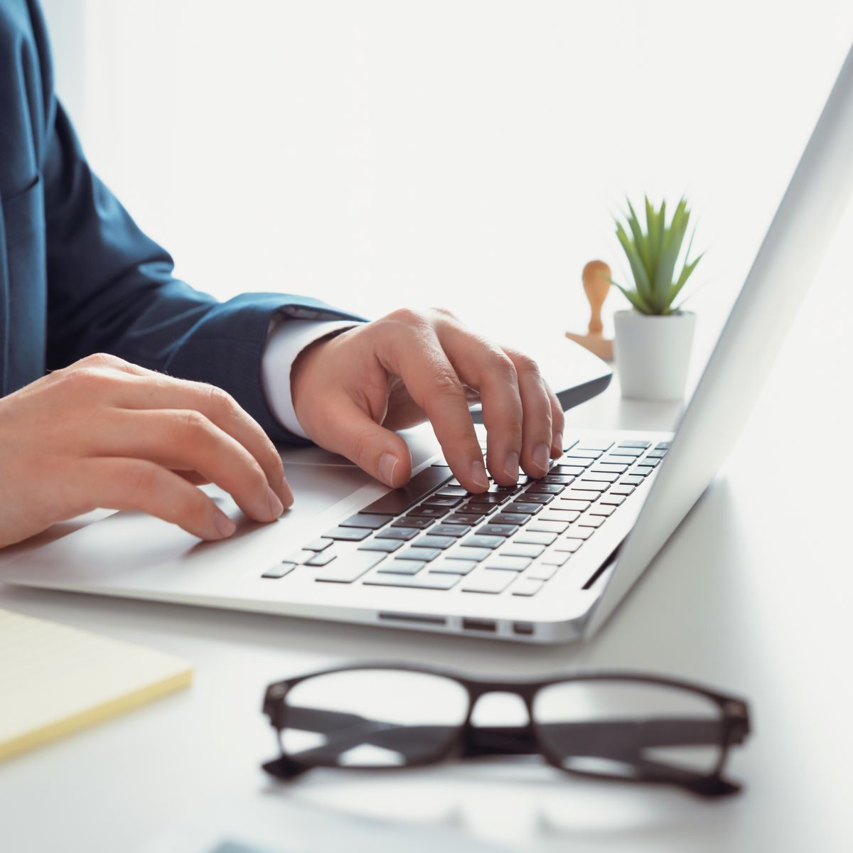 Person typing on a computer