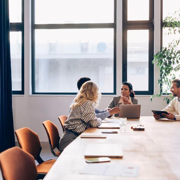 Scientist using a pipette to place a liquid sample on a glass slide