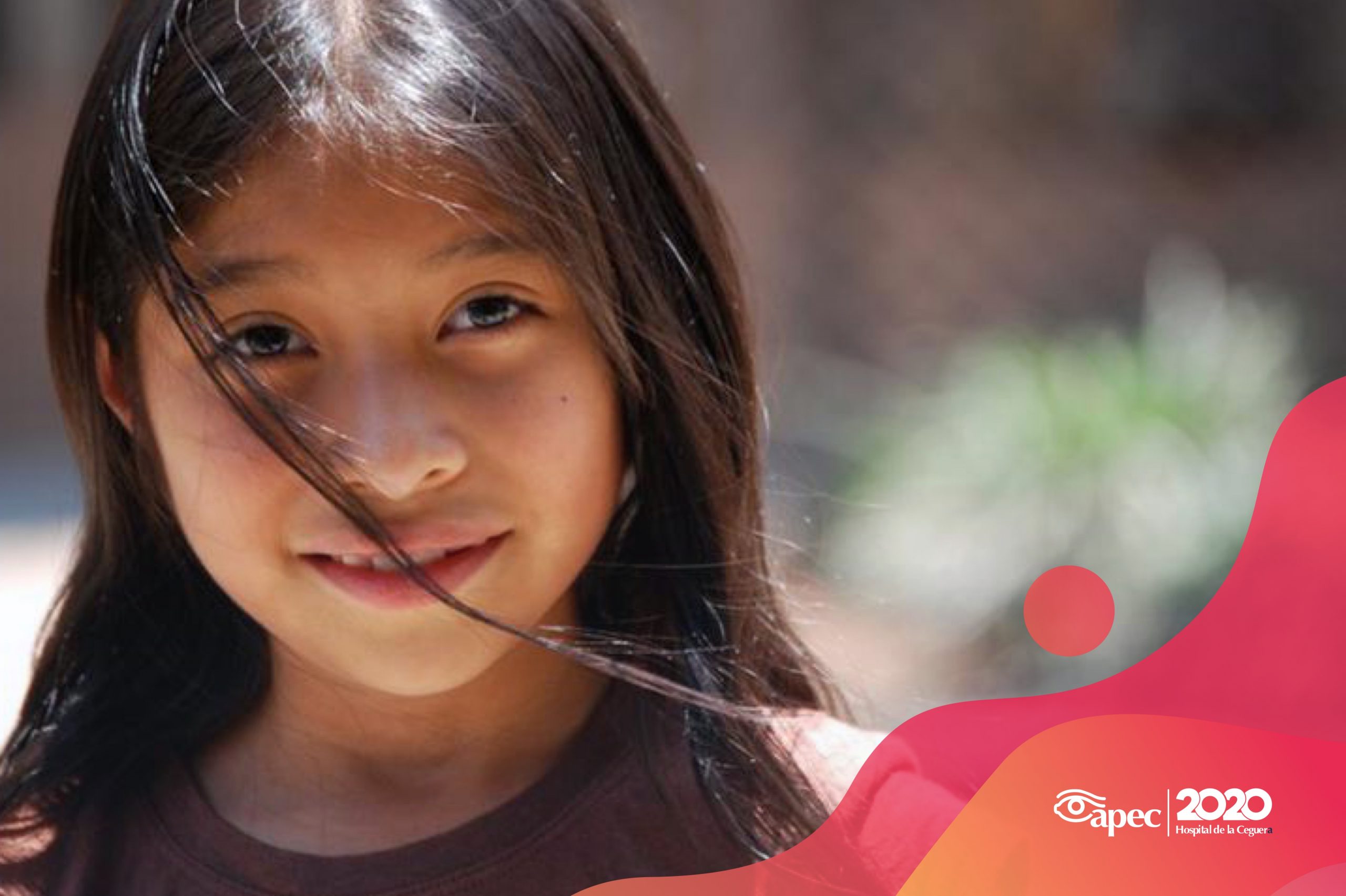 Young woman wearing glasses smiles