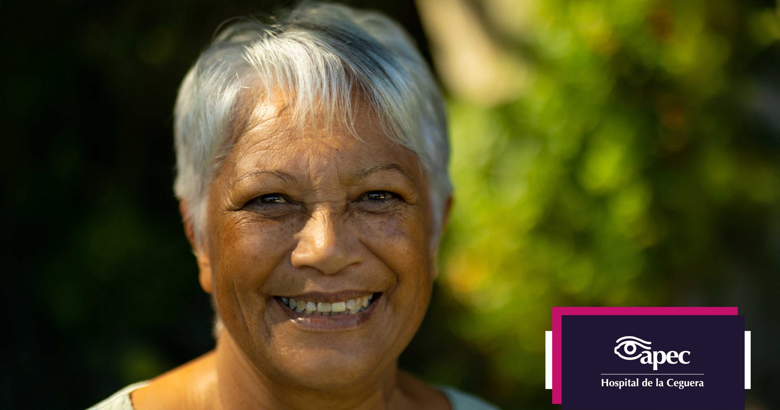 Young woman wearing glasses smiles