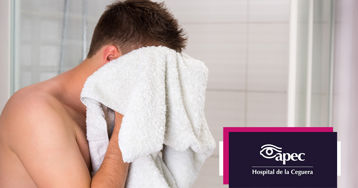 Young woman wearing glasses smiles