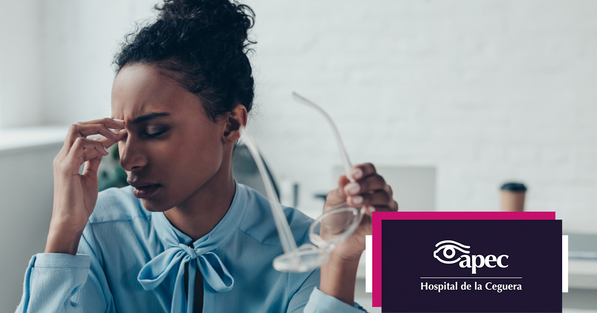Young woman wearing glasses smiles