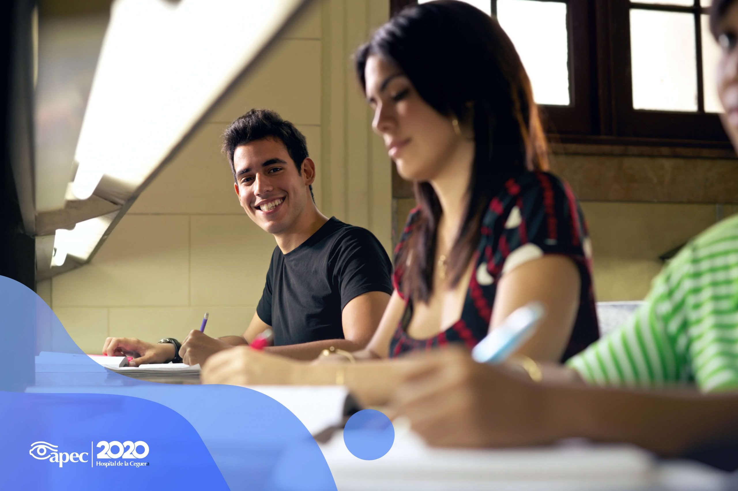 Young woman wearing glasses smiles