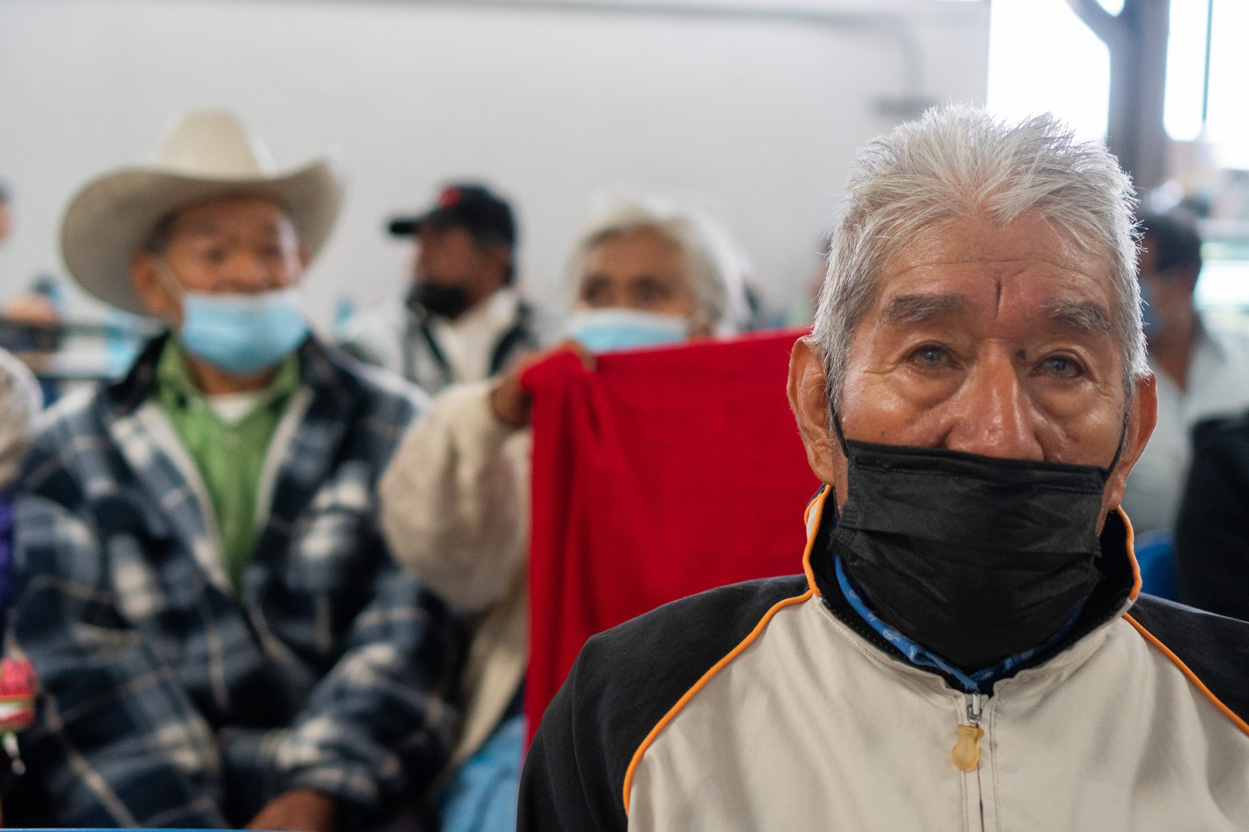 Young woman wearing glasses smiles