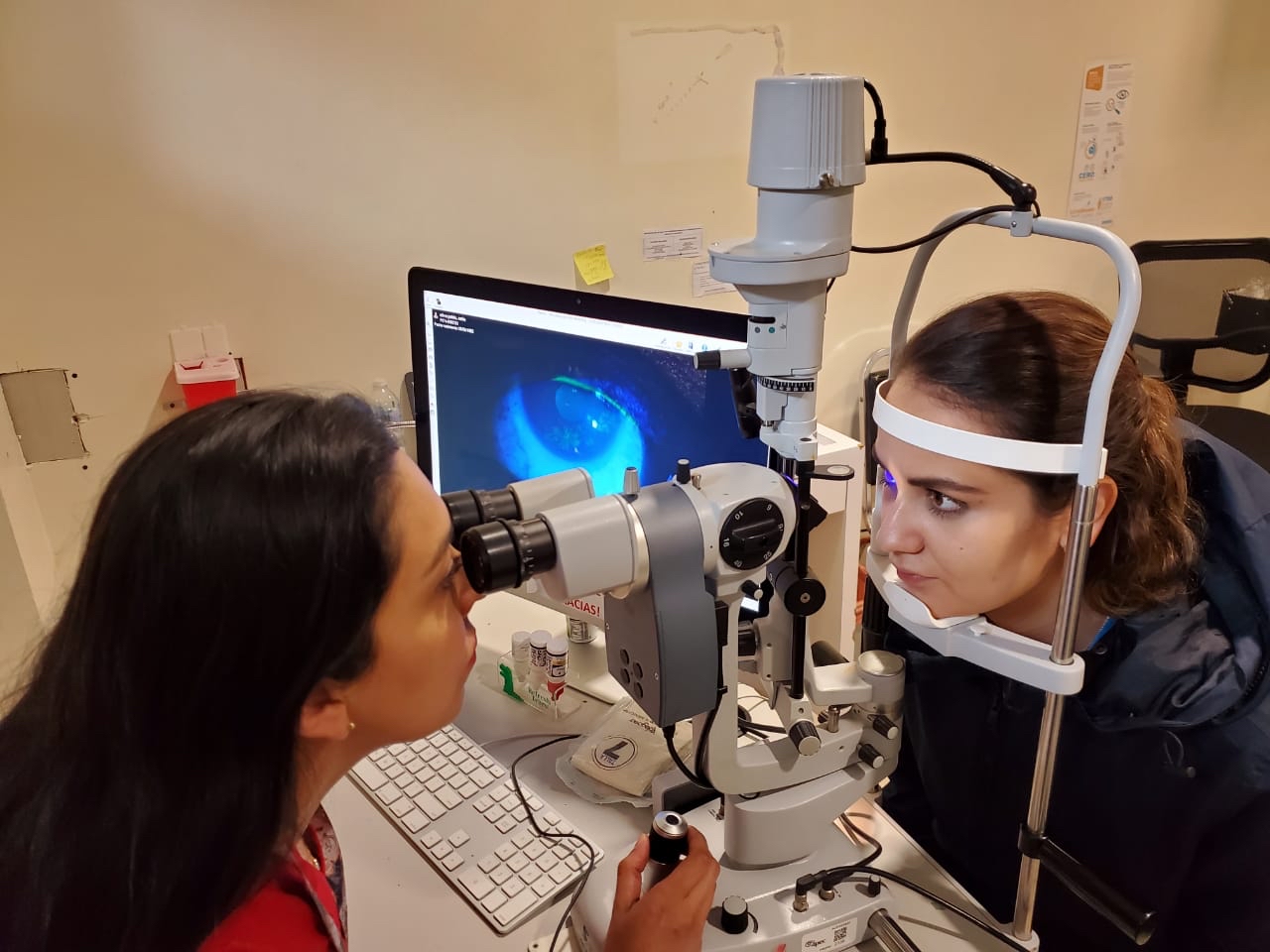 Young woman wearing glasses smiles