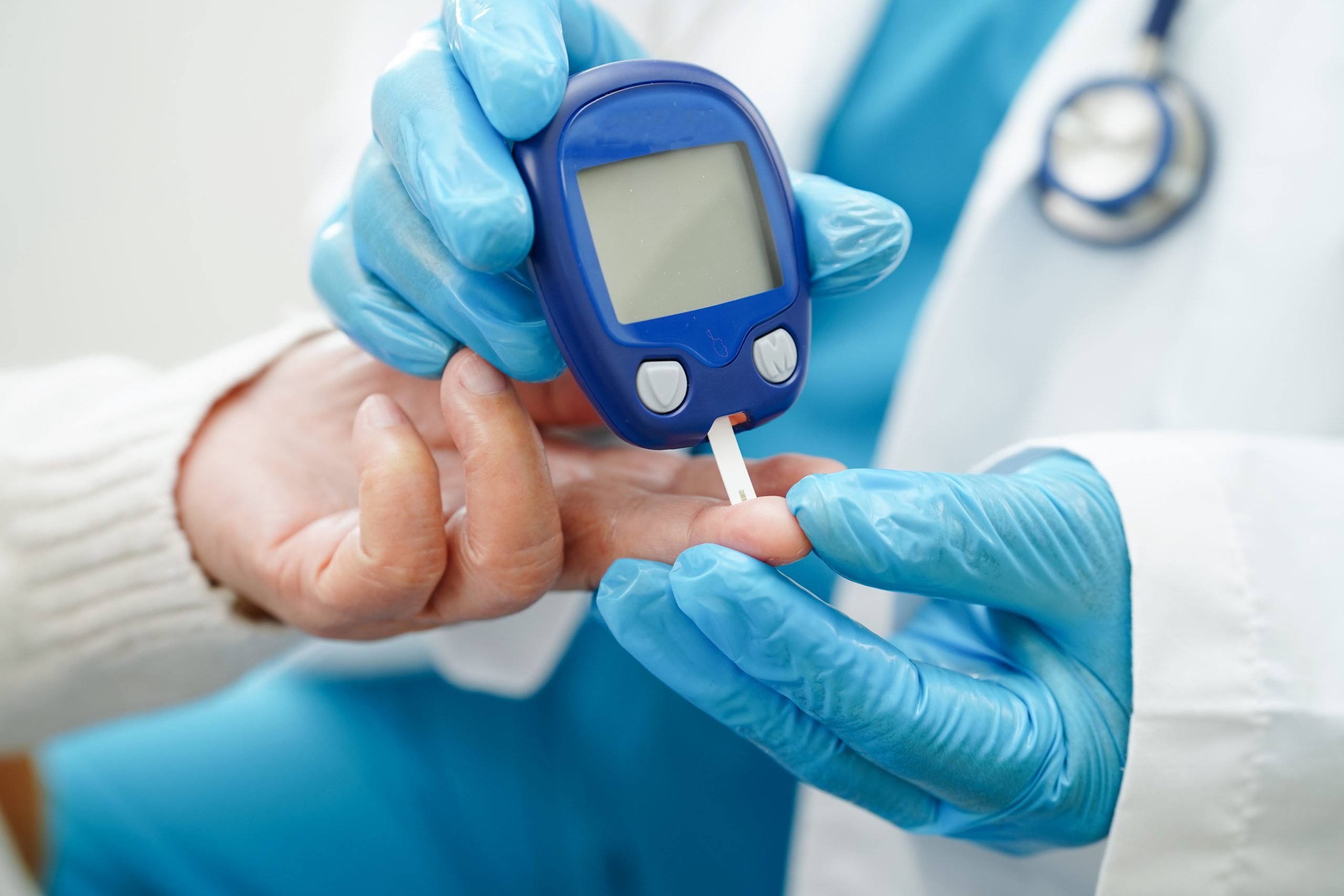 Young woman wearing glasses smiles