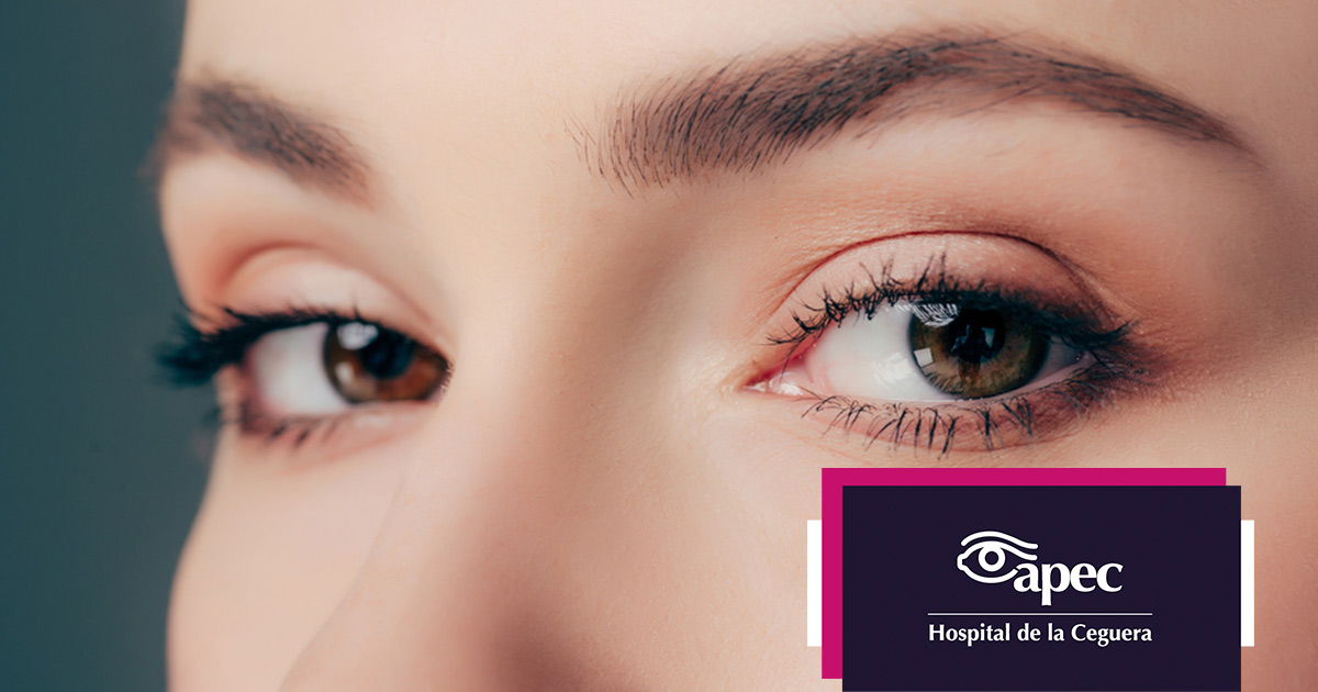 Young woman wearing glasses smiles