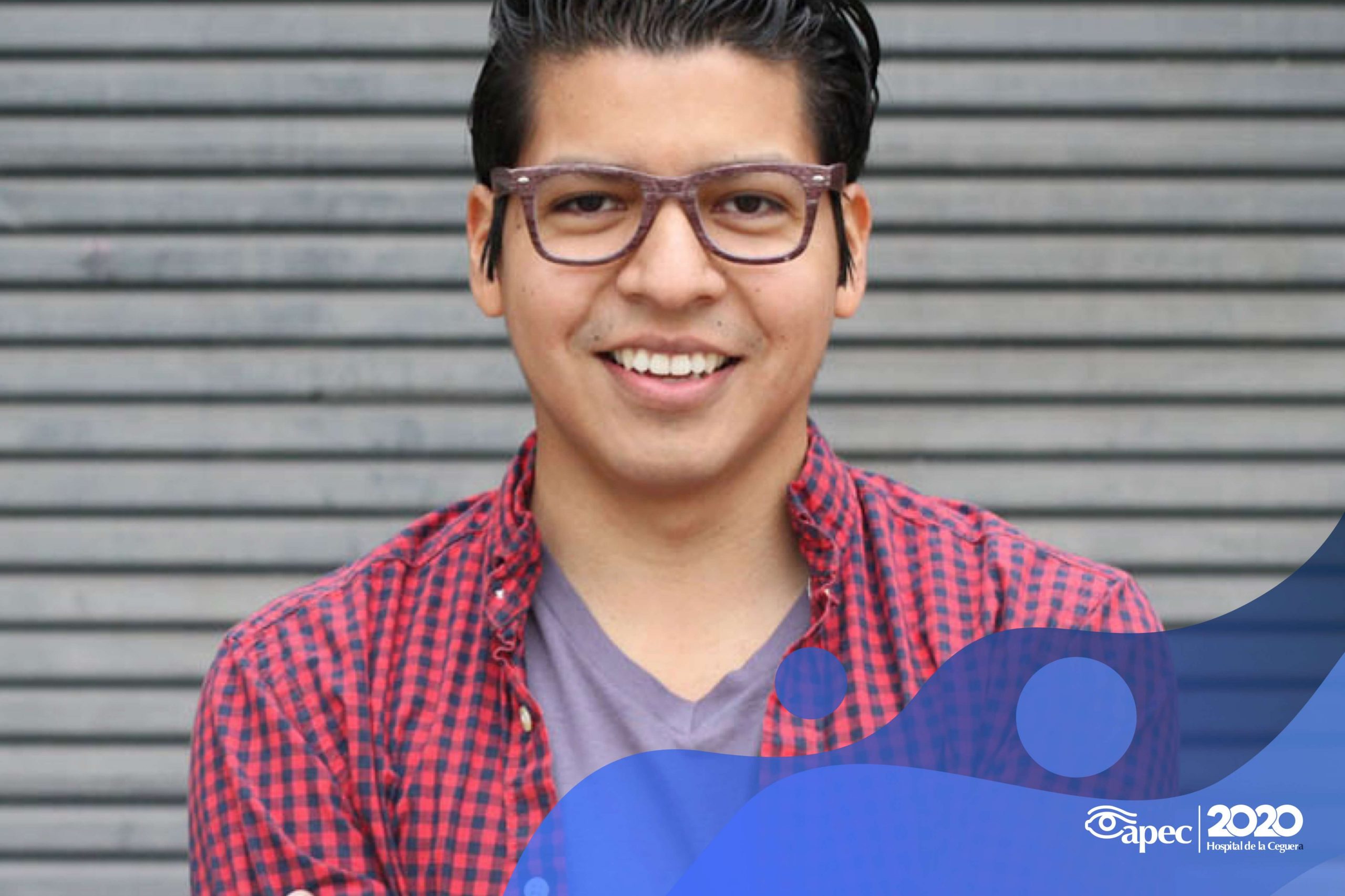 Young woman wearing glasses smiles