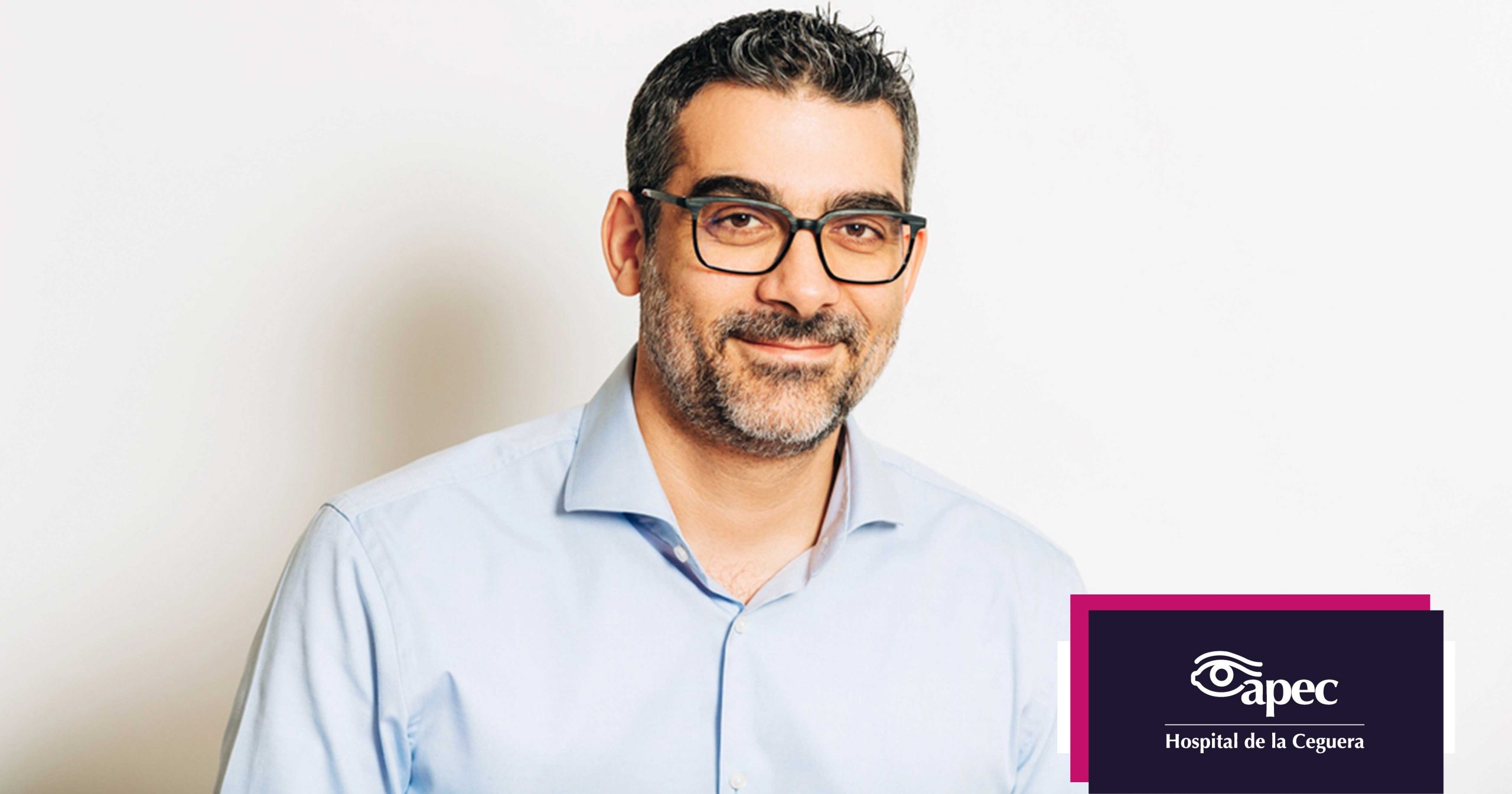 Young woman wearing glasses smiles