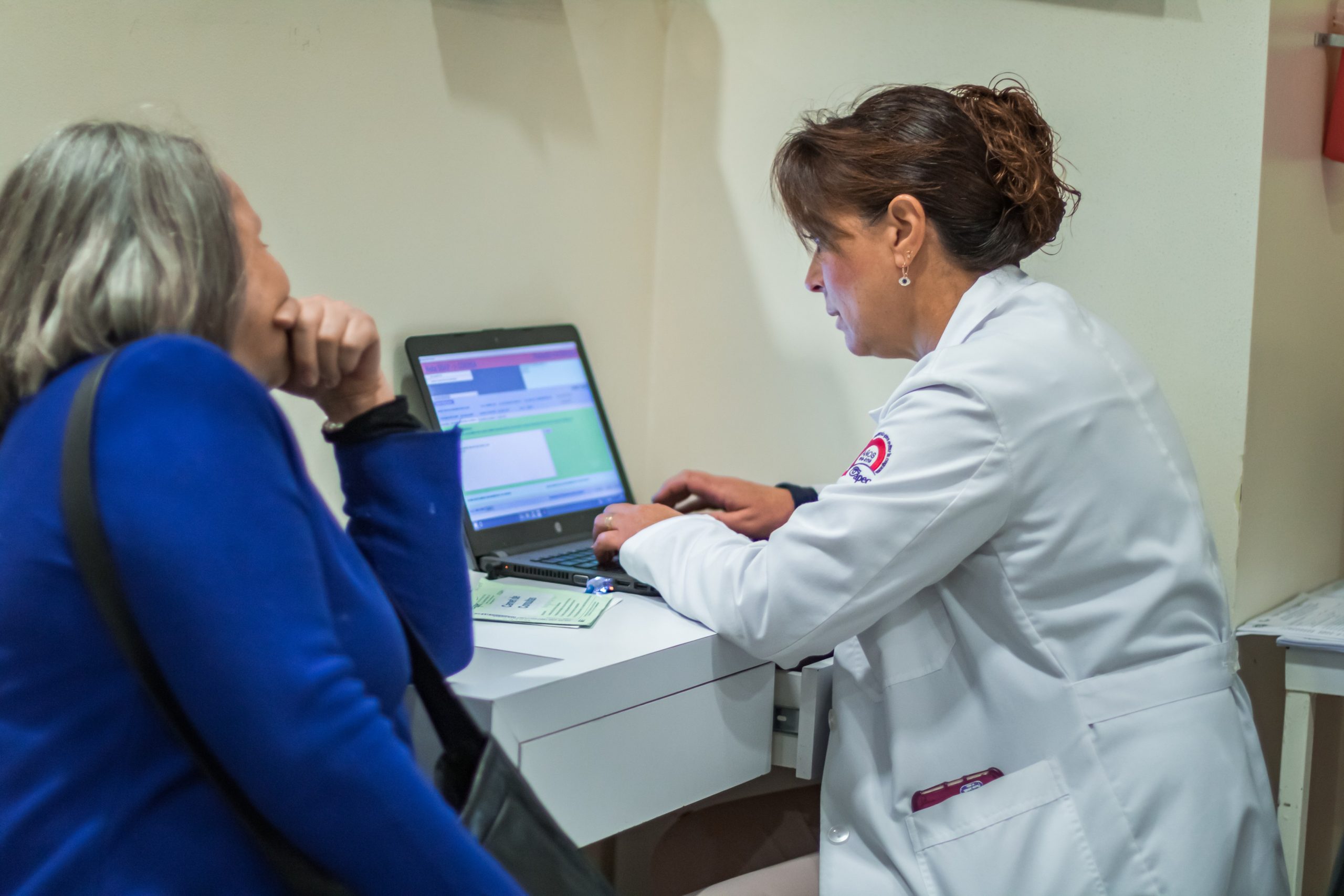 Young woman wearing glasses smiles