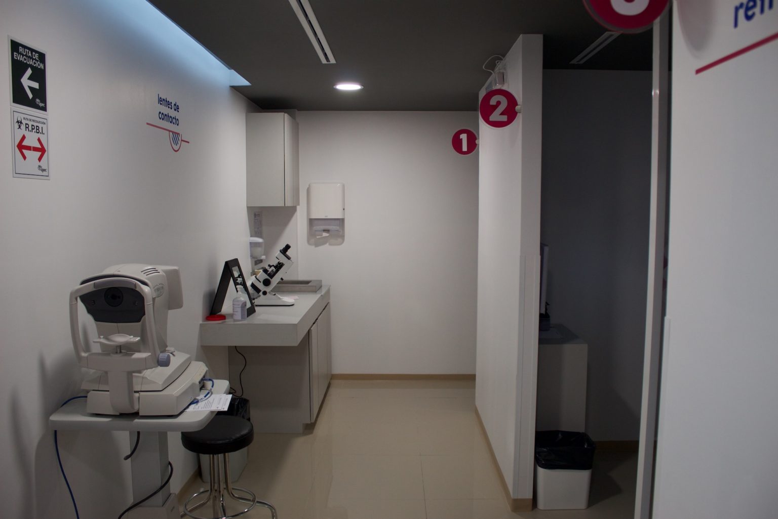 Young woman wearing glasses smiles