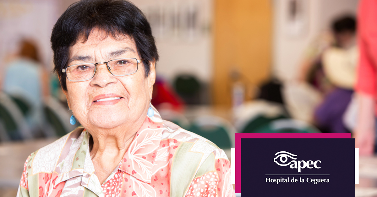 Young woman wearing glasses smiles