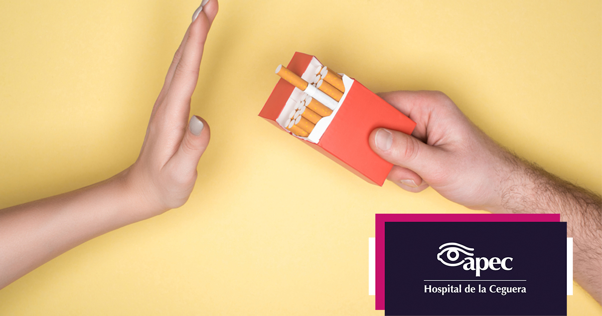 Young woman wearing glasses smiles