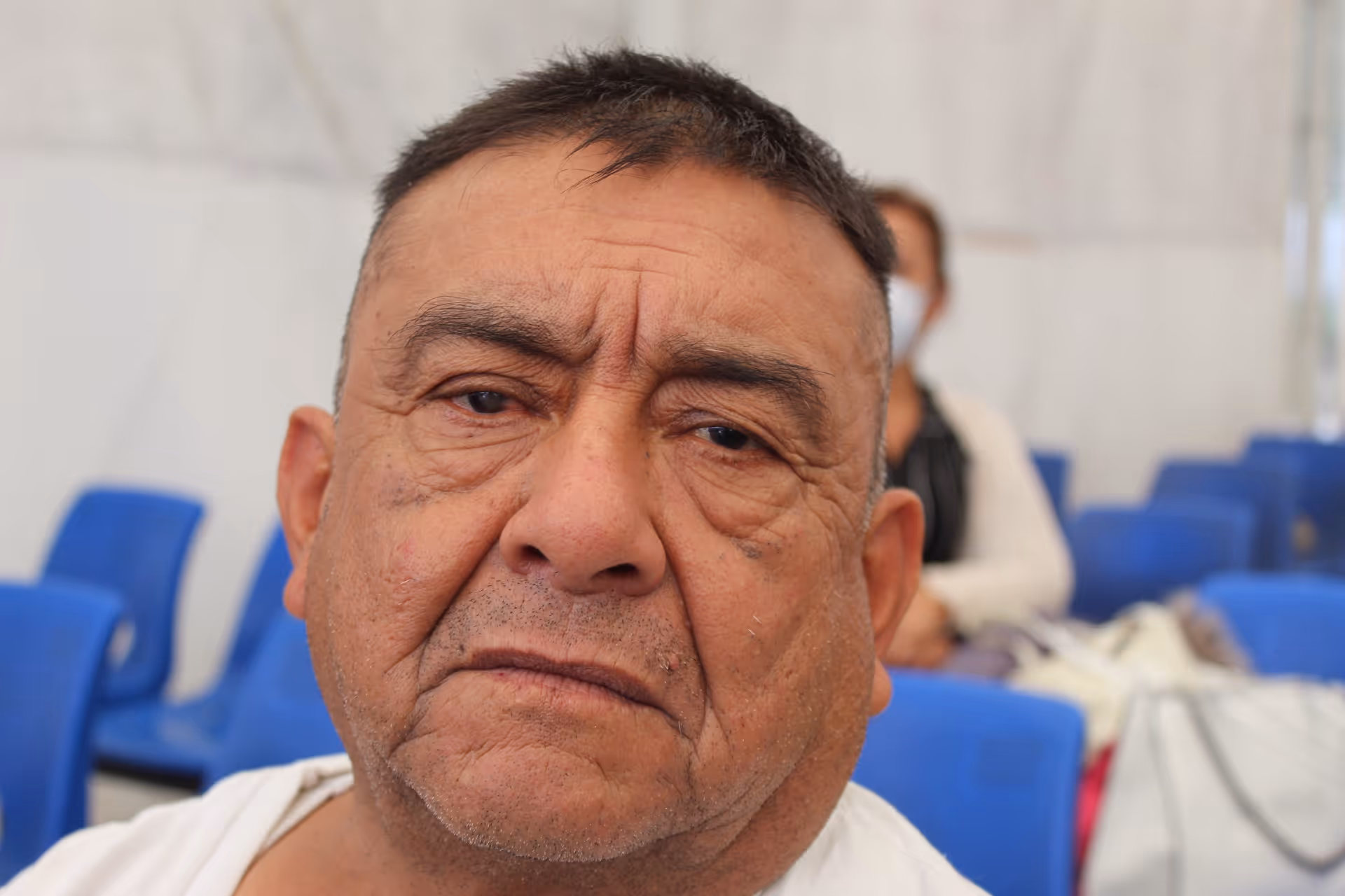 Young woman wearing glasses smiles