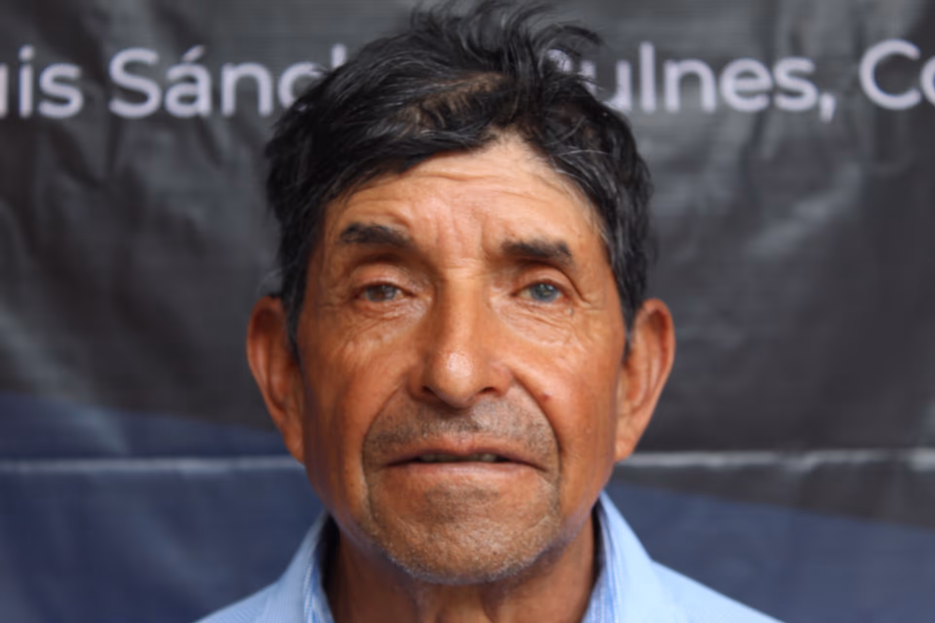 Young woman wearing glasses smiles