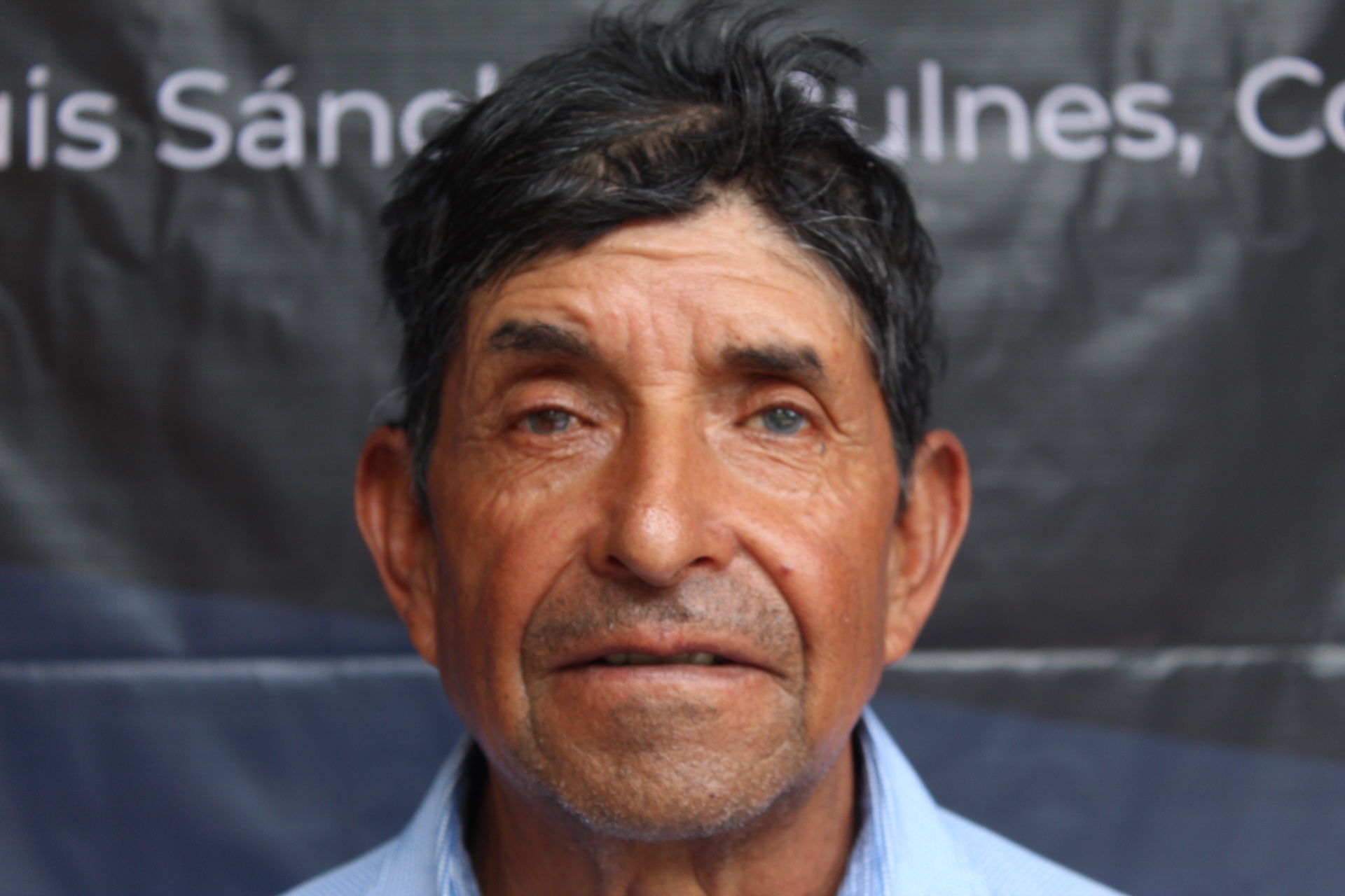Young woman wearing glasses smiles