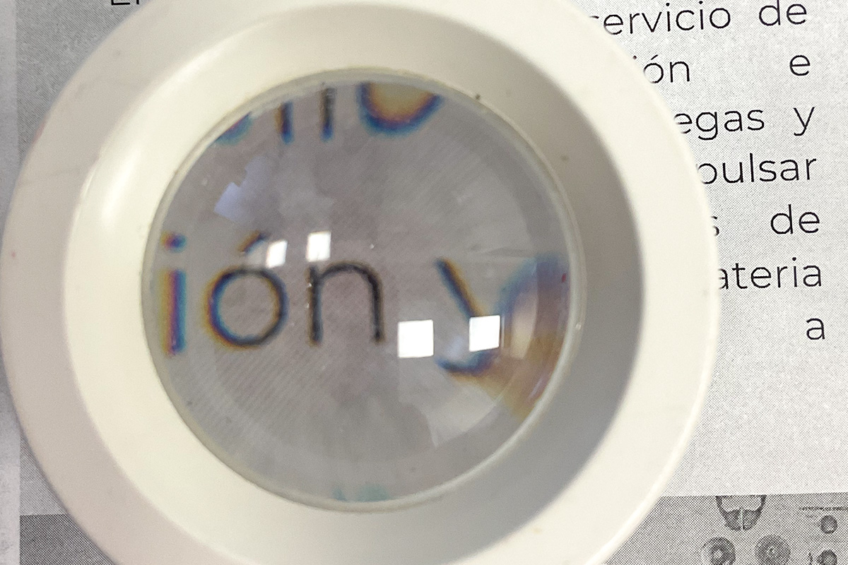 Young woman wearing glasses smiles