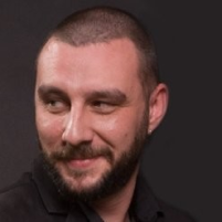 Radiance Visual. Team member. Srdjan Miloradovic. Co-founder. Smiling and facing right.