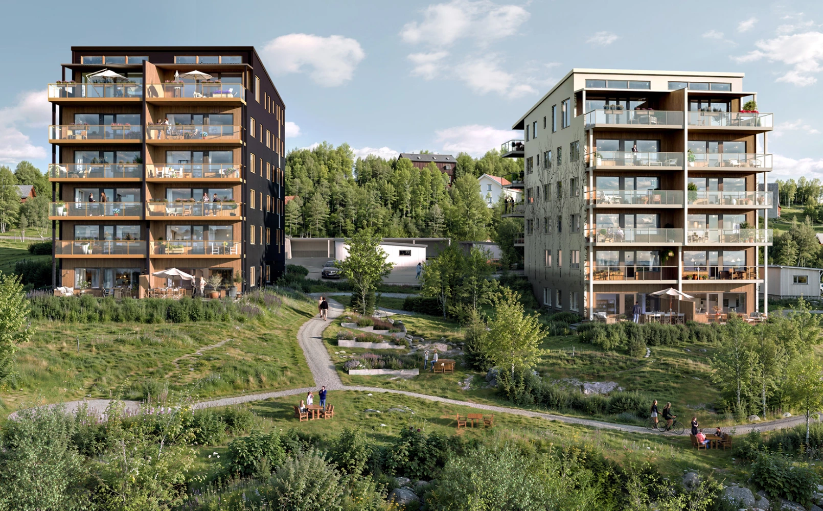 Radiance Visual. Two modern apartment buildings with balconies overlooking a green park area with walking paths and people enjoying the outdoors.