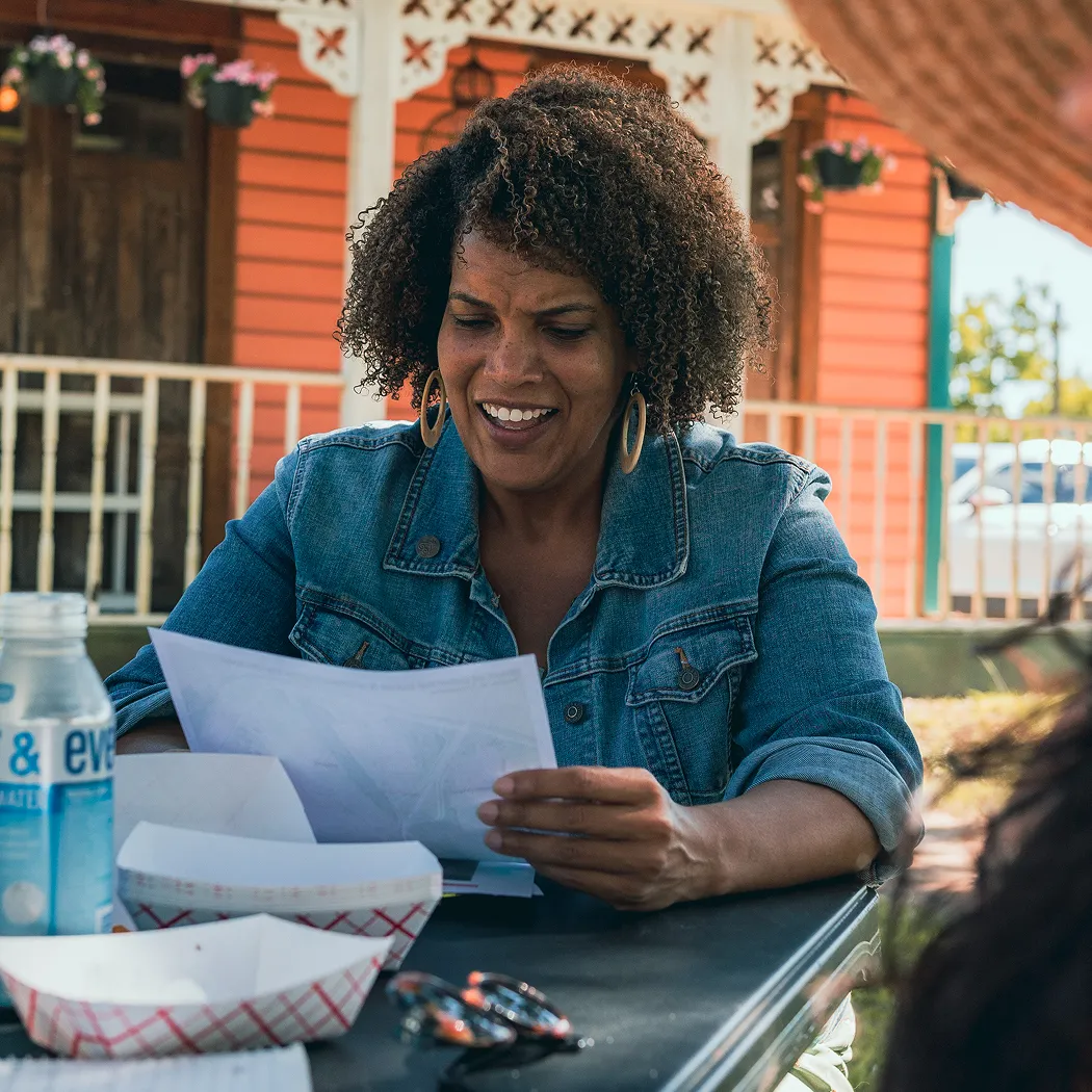 Image of woman analyzing map proposal