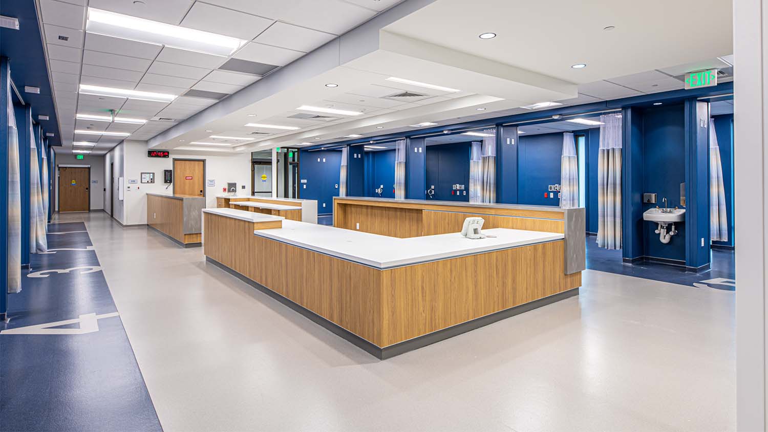 Patient rooms and nurse station in the Pain Consultants of East Tennessee Clinic and Ambulatory Surgery Center by Johnson & Galyon