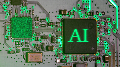 AI chip glowing green on a computer circuit board.