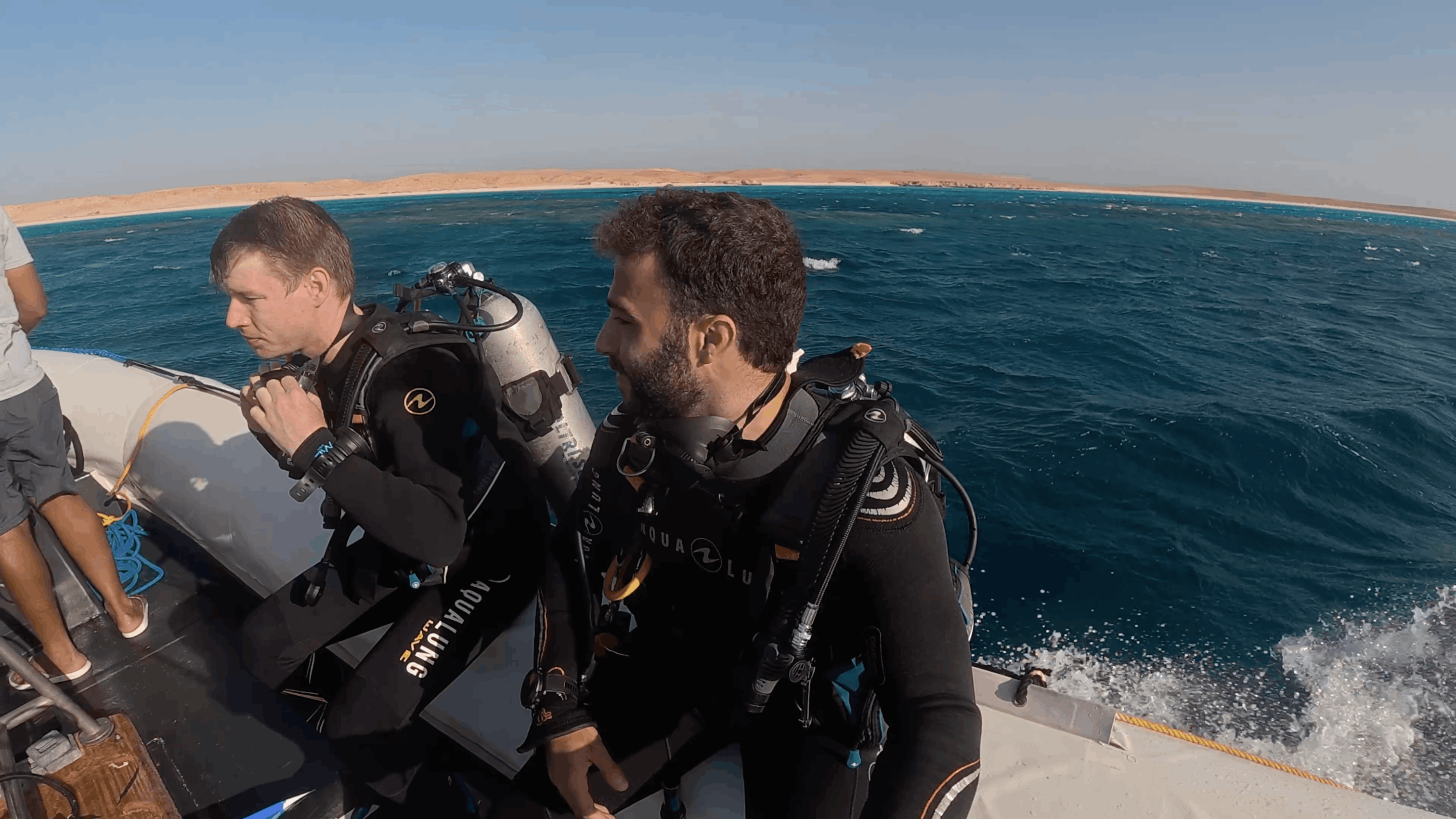 Divers boarding the Zodiac tender near Hurghada, Red Sea, Egypt