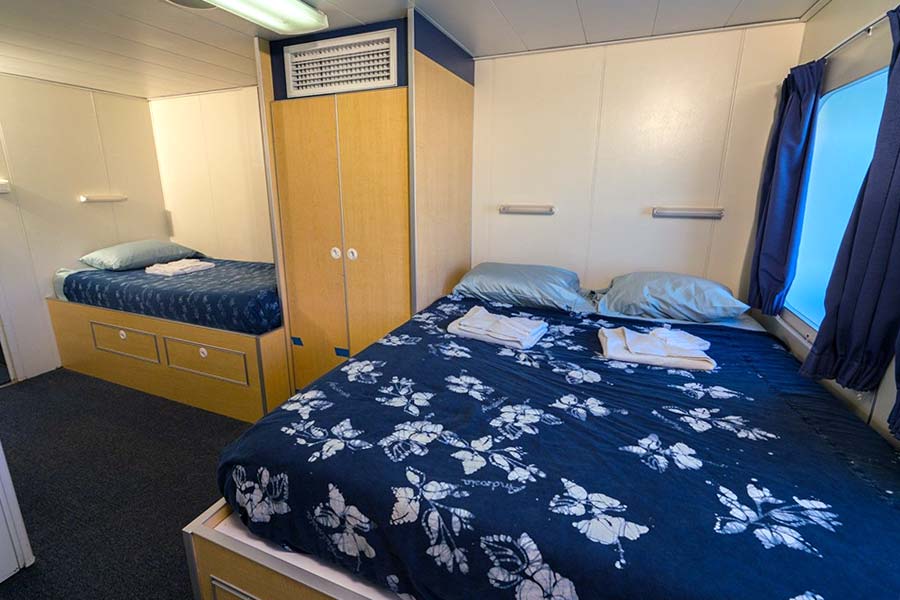 An ocean-view cabin aboard the Aqua Cat