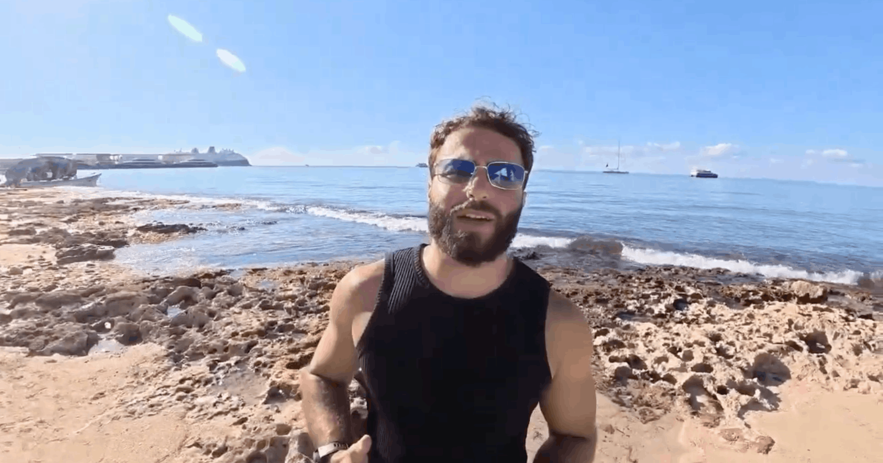 Austin on the shore before a dive in Cozumel, Mexico