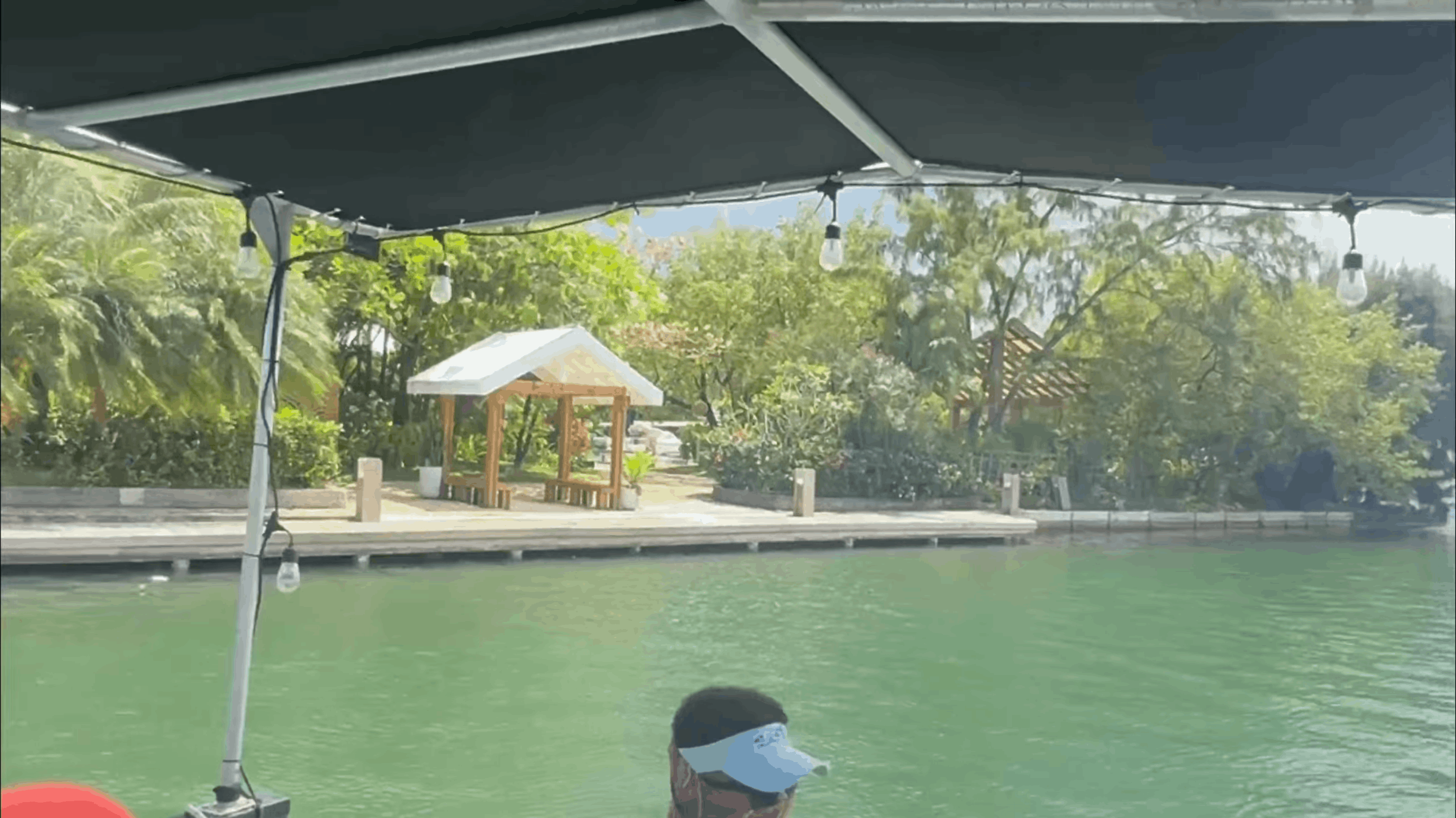 Crossing to the private island by water taxi at Barefoot Cay Resort, Roatán, Honduras