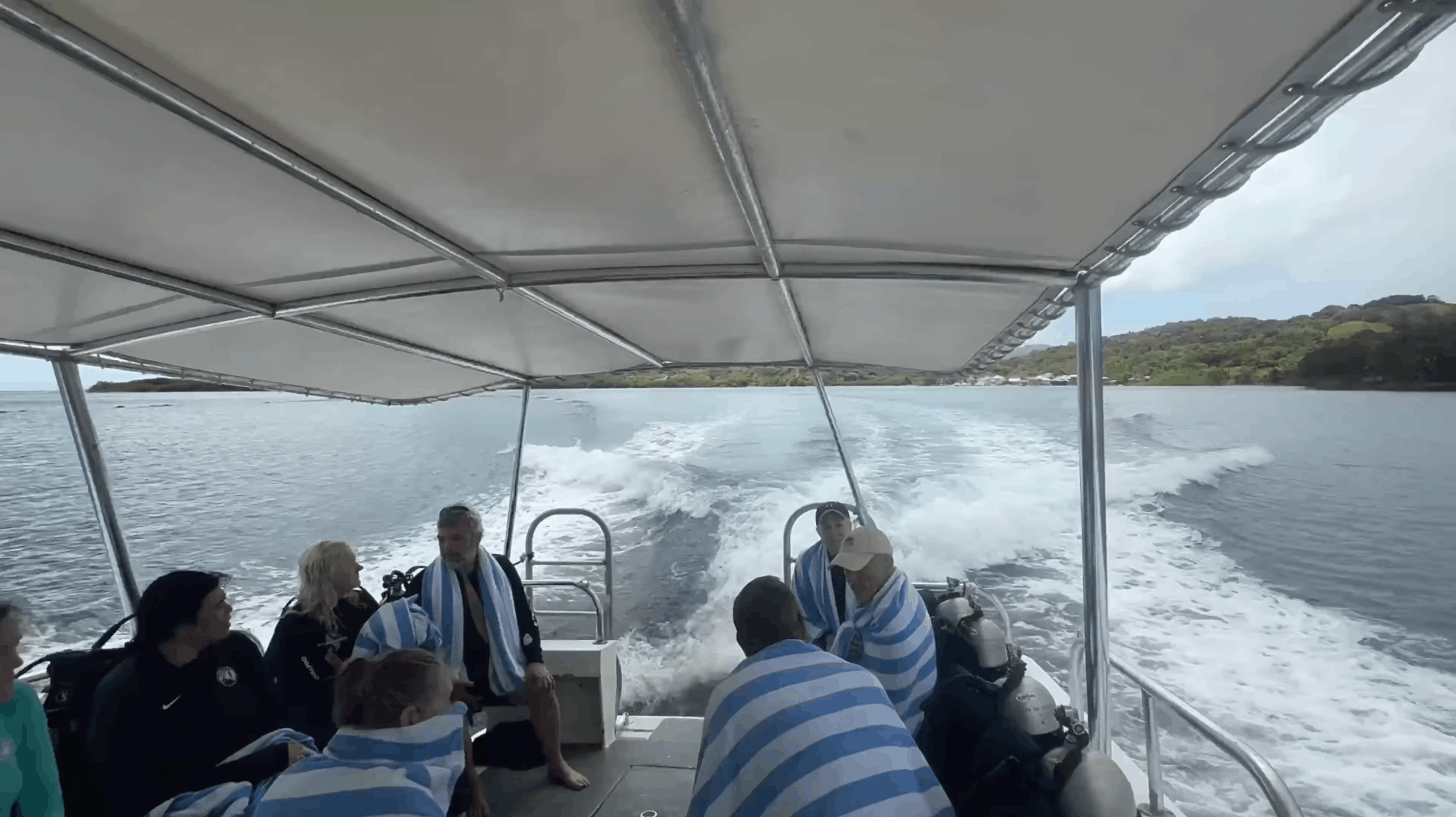On the dive boat heading out from Barefoot Cay, Roatán, Honduras