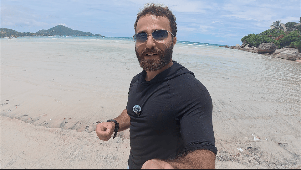 Divemaster Austin on the beach at Koh Tao, Thailand