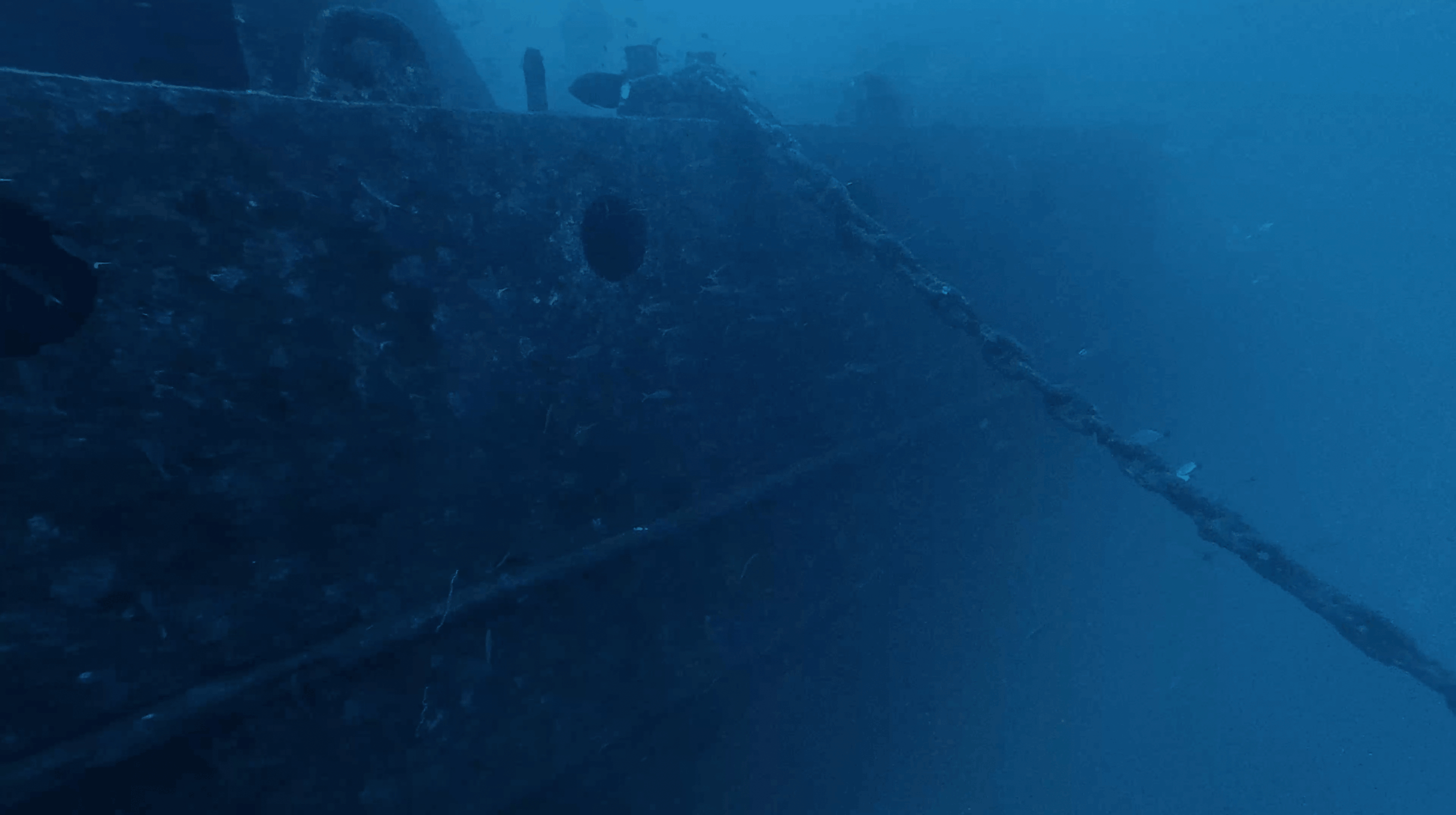 Encrusted hull plating along the side of the HTMS Sattakut, Koh Tao