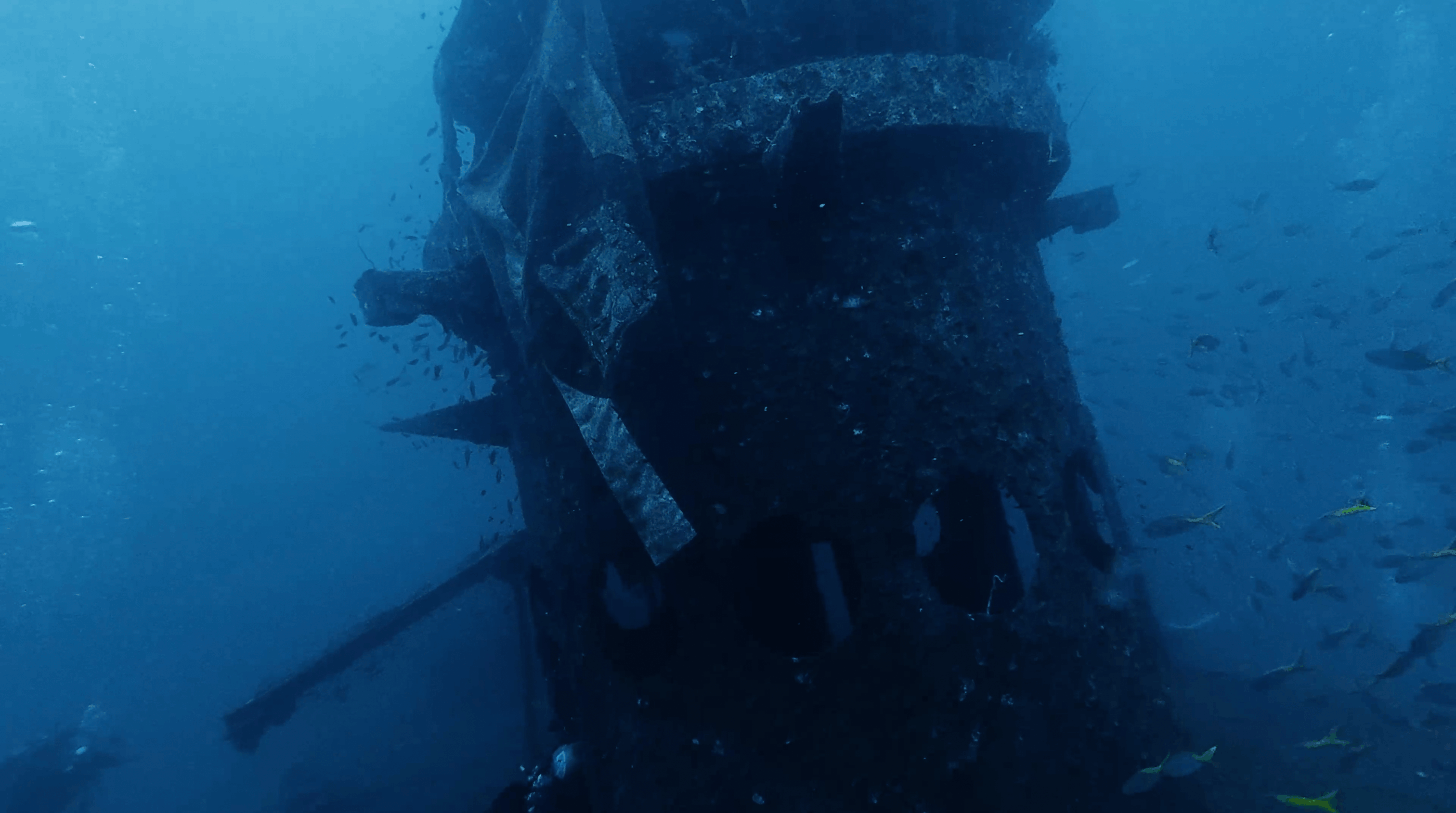 Looking up at the mast and gun structure of the HTMS Sattakut, Koh Tao