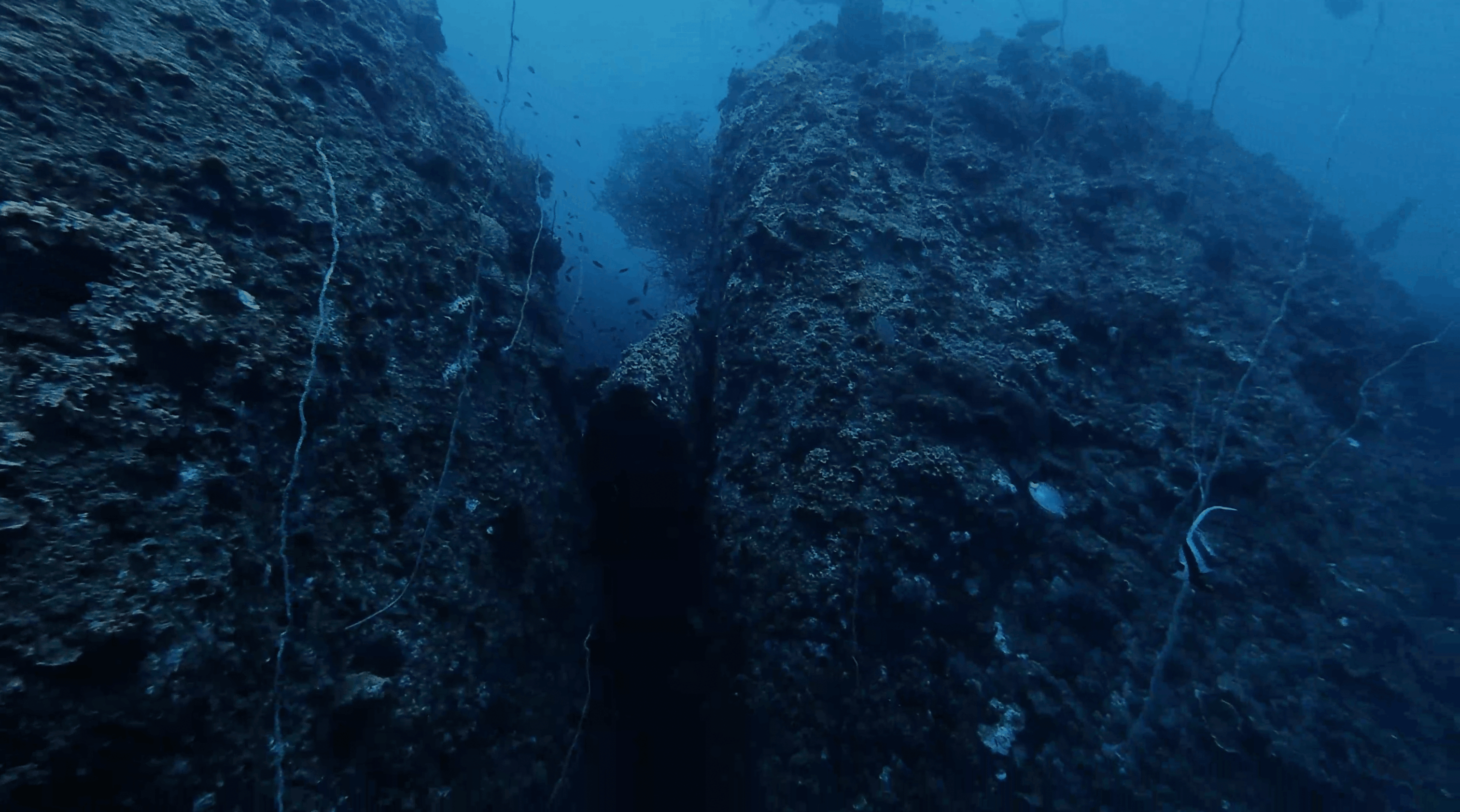Narrow channel running between two granite boulders at Boulders, Koh Tao