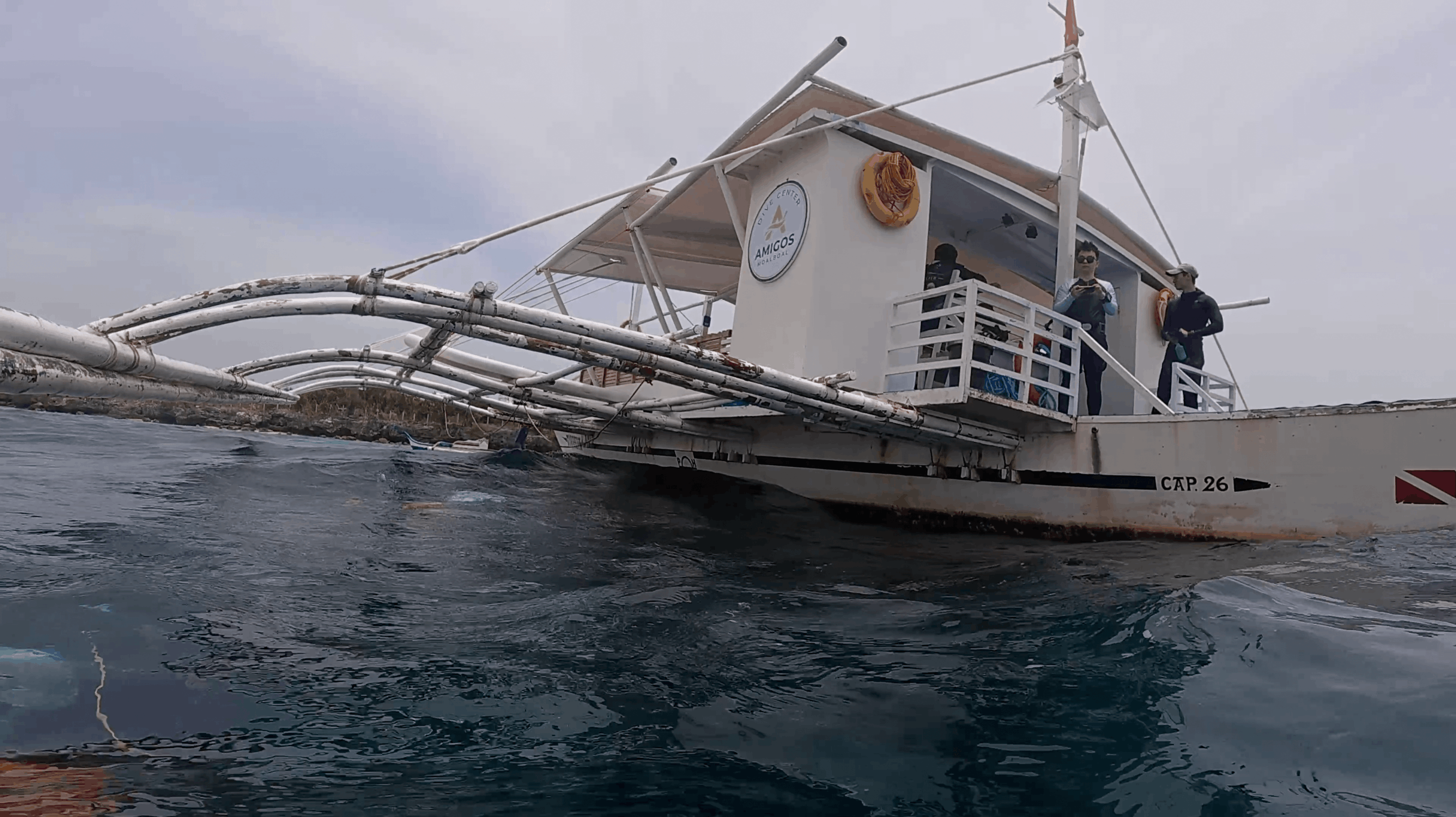 The Dive In Amigos boat at the surface off Tonga South, Moalboal