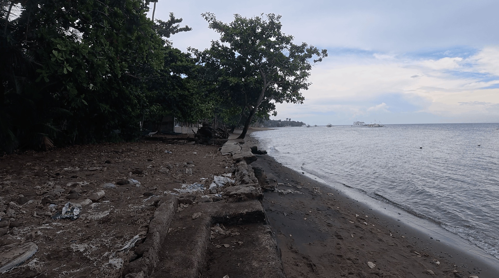 The rocky shoreline at El Dorado, Dauin, Philippines