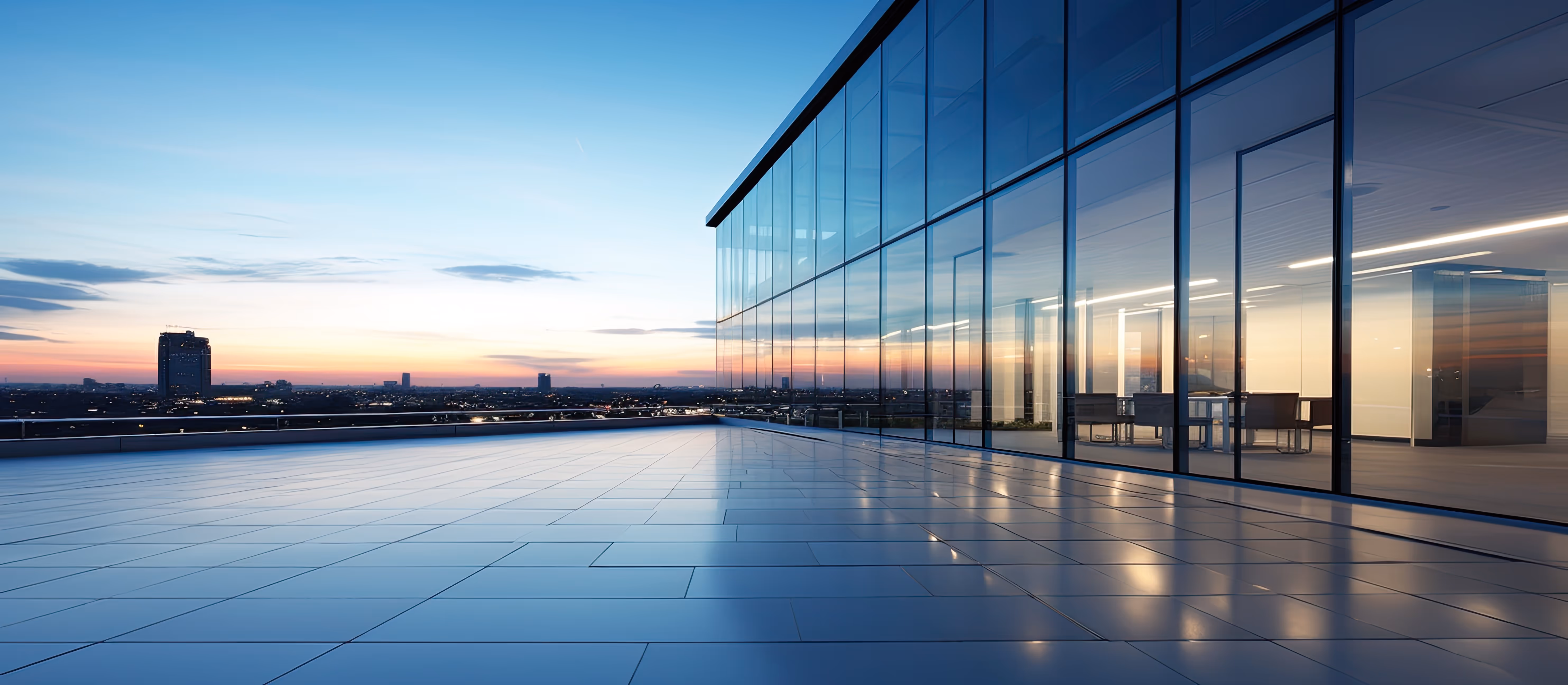 A beautiful photo of a building rooftop at sunset.