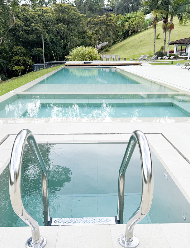 Luxury pool among greenery