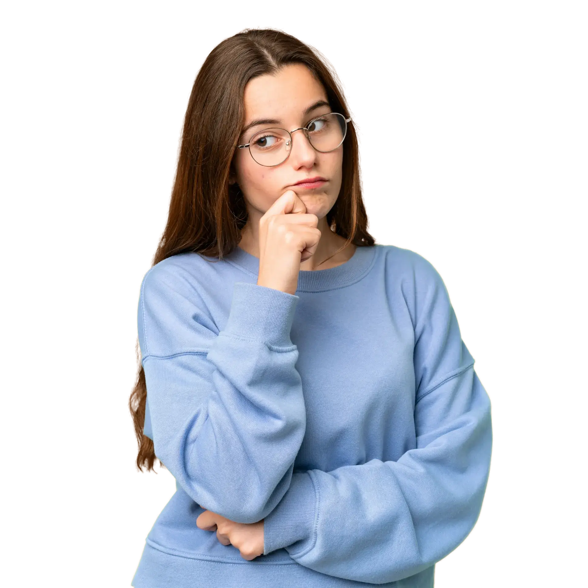 A woman in a blue sweater with her hand on her chin.