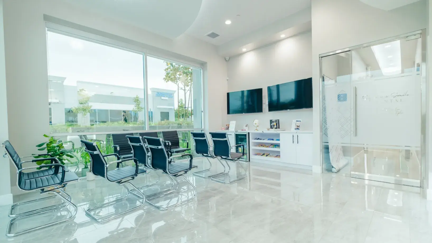 A conference room with chairs and a white board.