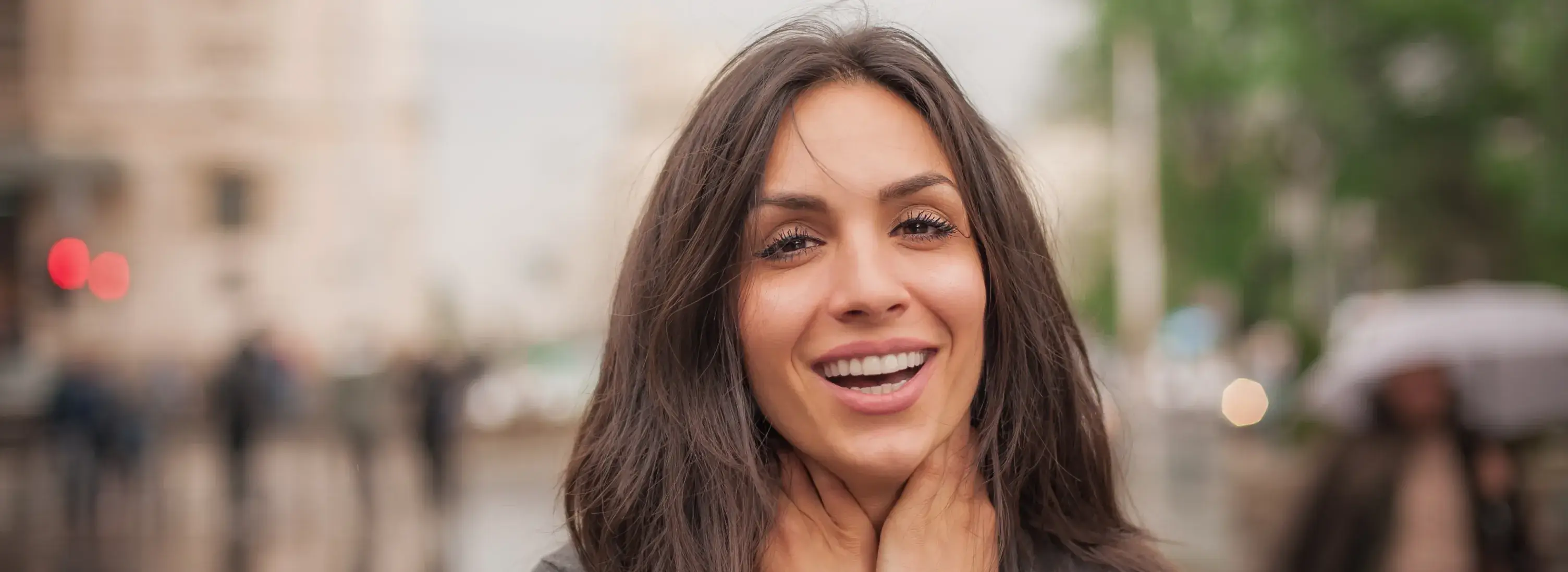 A woman with a smile on her face.