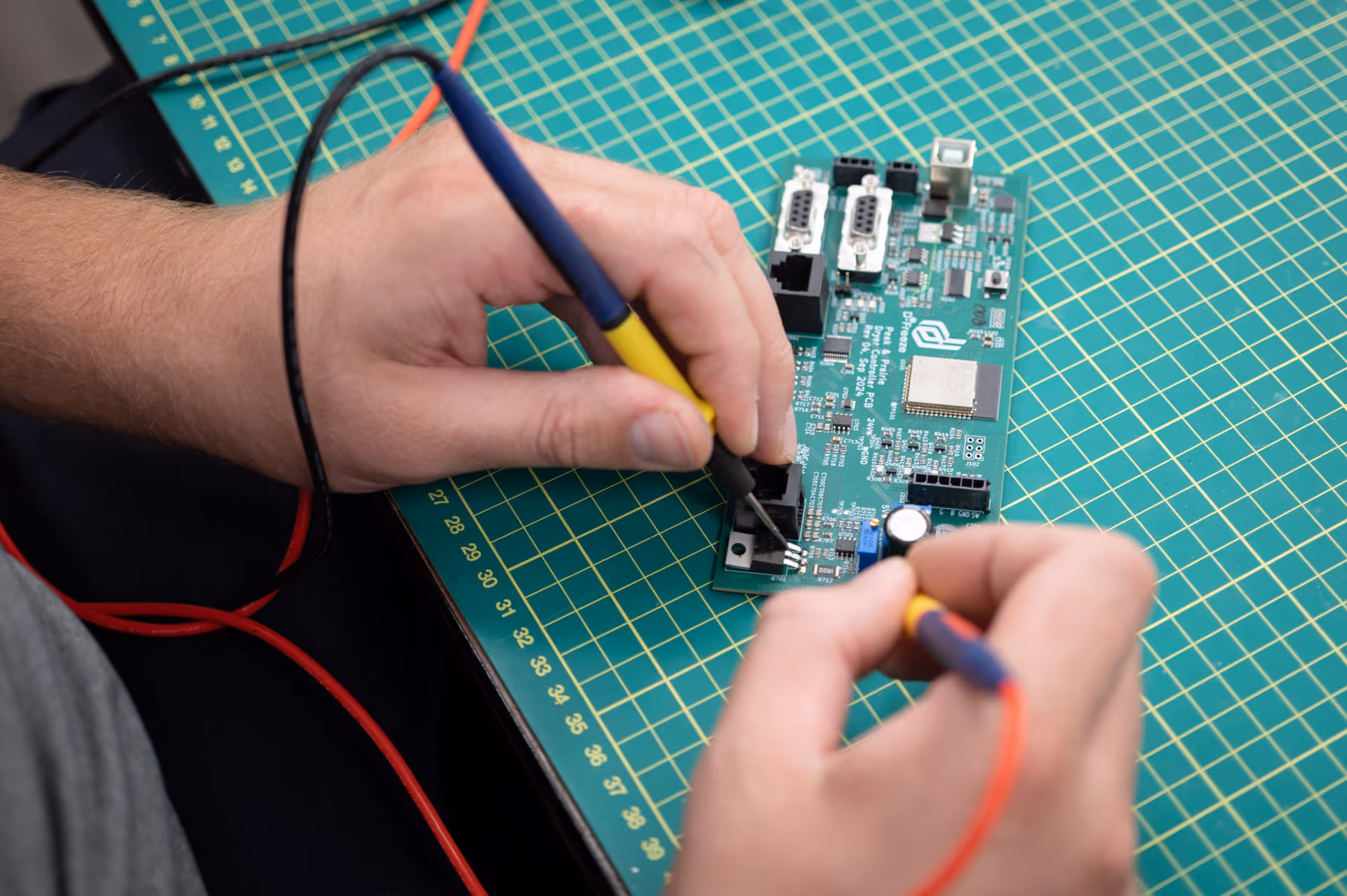 image of a engineer inspecting electric board for a freeze dryer