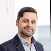 Headshot of Ven Adamov from KPMG