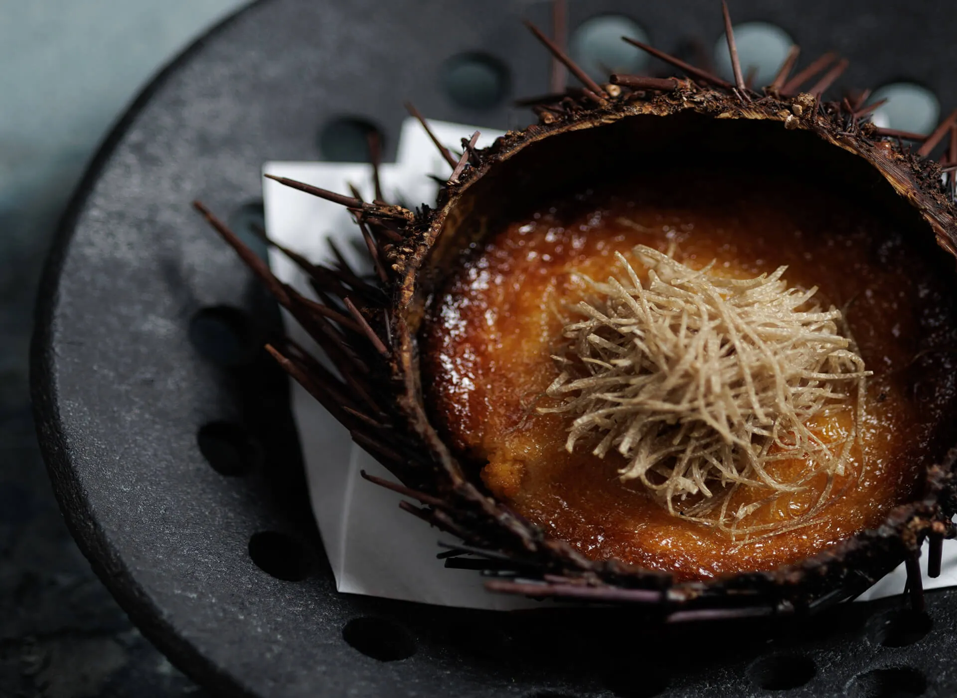 Roasted Uni Custard In half shell with truffle