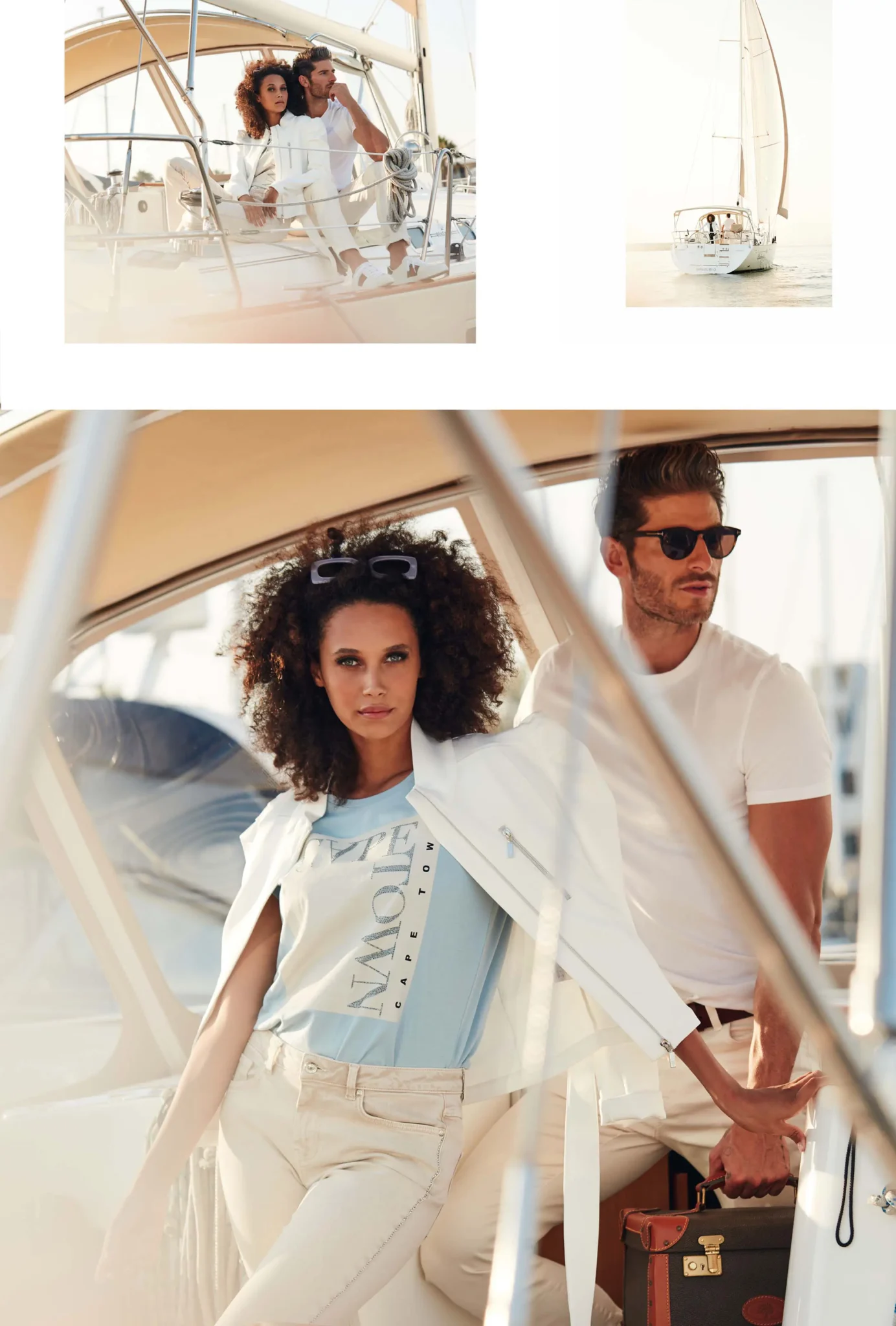 Stylish couple on a sailboat, with the woman leaning against the helm and the man holding a leather suitcase, both dressed in light, casual clothing.