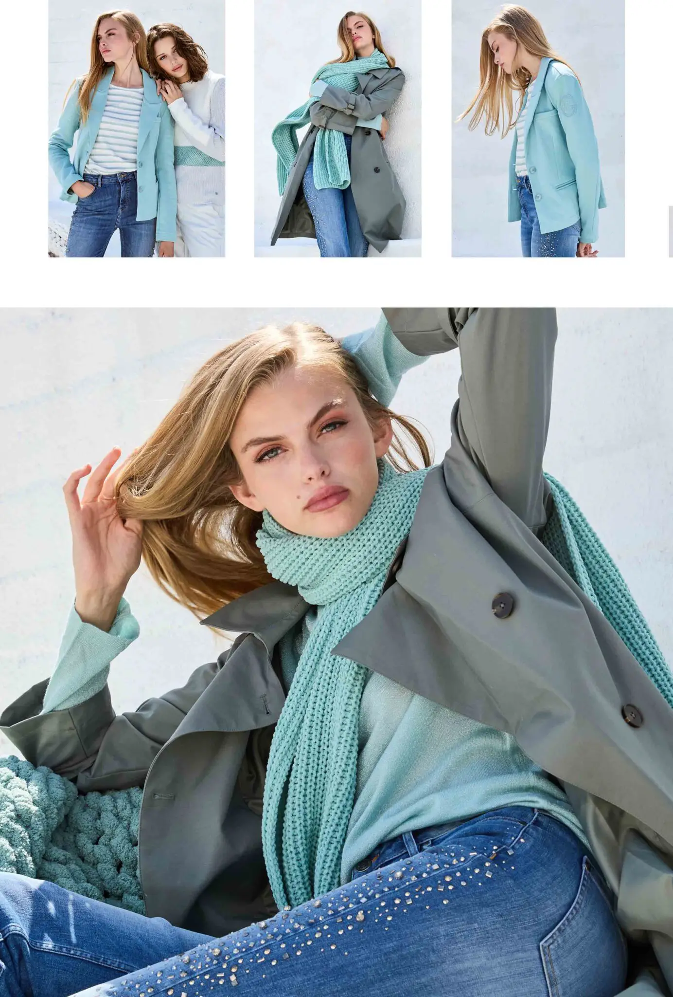 Woman with blonde hair wearing a gray coat, mint scarf, light blue sweater, and blue jeans with embellishments, posing outdoors against a light background.