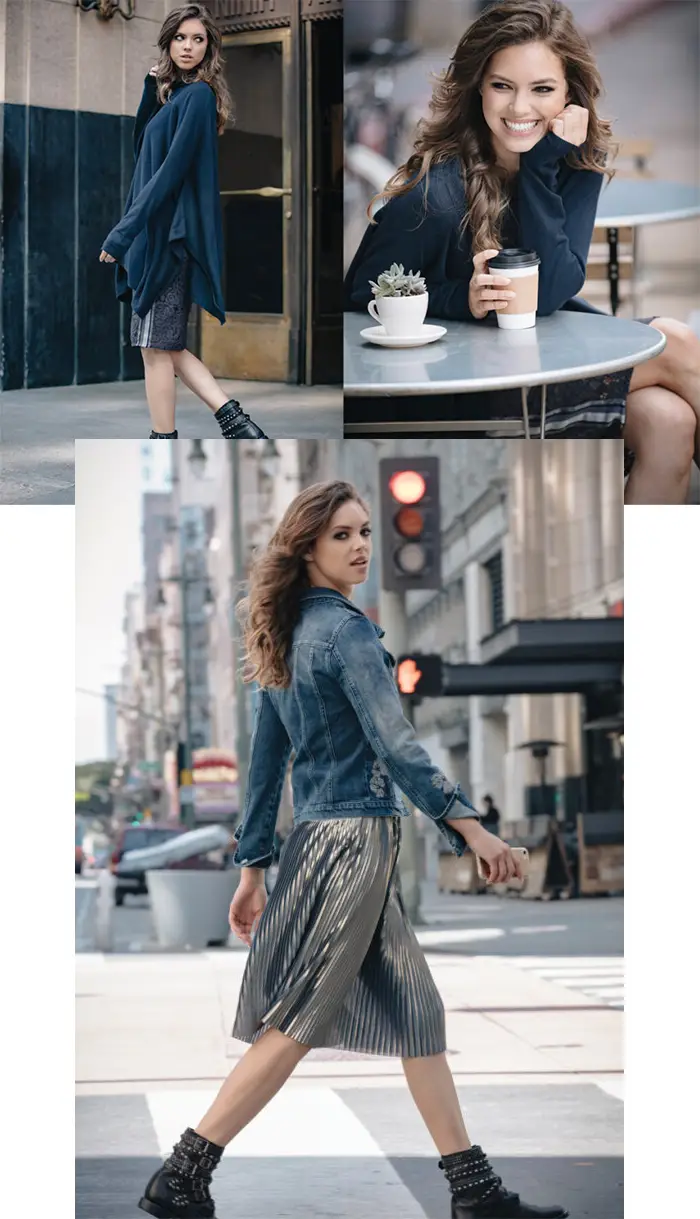 Woman with long wavy hair wearing a dark sweater and patterned skirt posing outside, smiling at a café table, and walking on a city street in a denim jacket and metallic pleated skirt.
