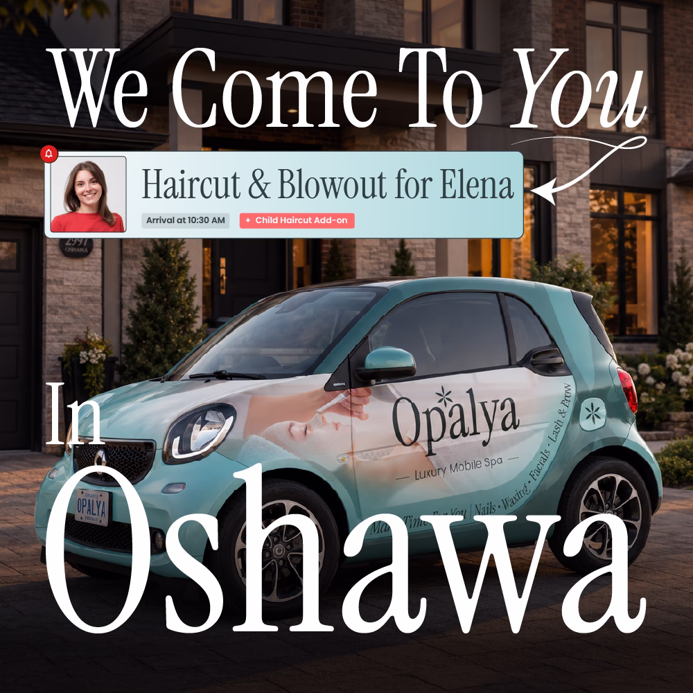Small teal car with Opalya Luxury Mobile Spa logo parked outside a house at sunset.